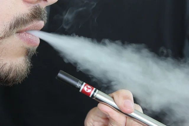A colorful cherry slush vape device with ice crystals, highlighting the slushie effect